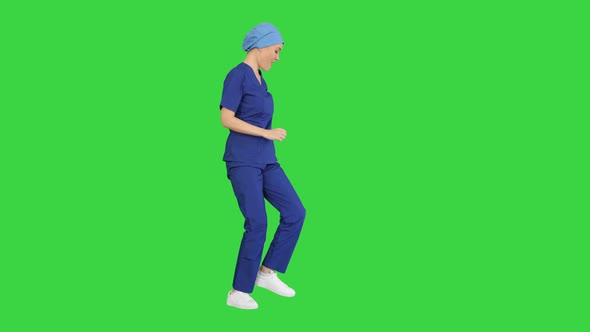 Girl Doctor Is Dancing and Walking on a Green Screen, Chroma Key