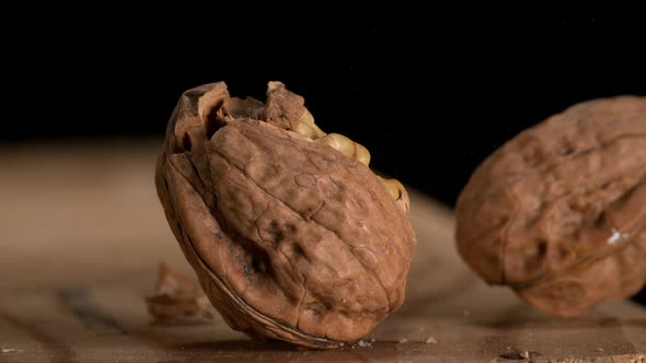 Hammer breaking Walnut, juglans regia, Slow Motion