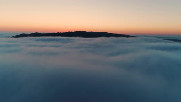 Flying Over Dusk Clouds