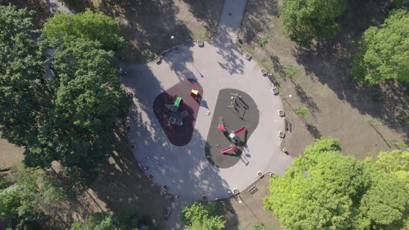 Drone Top View of Happy Families Playing in Public Park Playground in Sunny Weekend Day