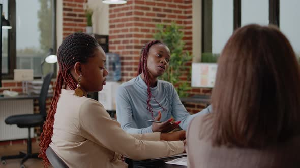 Close Up of Business Woman Presenting Project Ideas