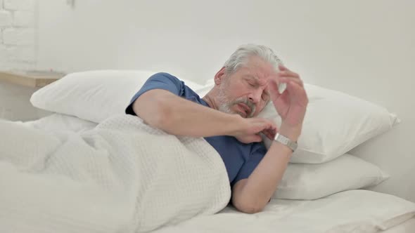 Uncomfortable Old Man Trying To Sleep