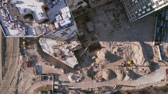 Top Down Aerial Over the Construction Site of a Large Residential or Office Center