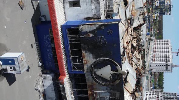 Vertical Video of a Destroyed Building of a Shopping Center in Bucha Ukraine