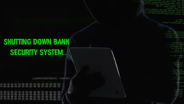 Criminal Shutting Down Bank Security System on Tablet, Illegal Funds Transfer