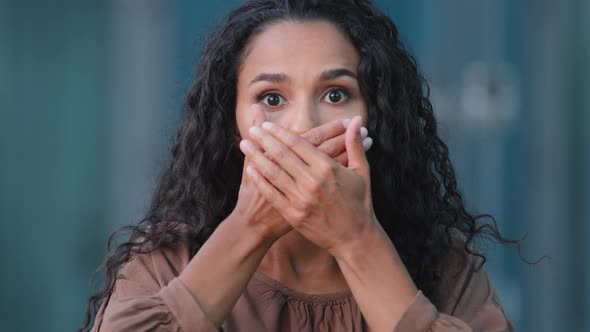 Portrait of Female Face Frightened Young Hispanic Woman Girl Model Gets Scared Suddenly Tells Talk