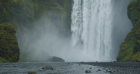 Beautiful Skogafoss Waterfall with River Reflection in Iceland