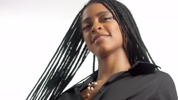 Mixed Race Woman with Hair Braids in Studio on White Closeup Portrait