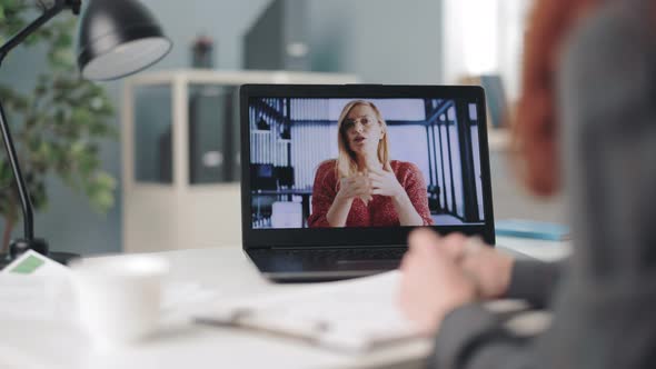 Business Women Having Conference Call