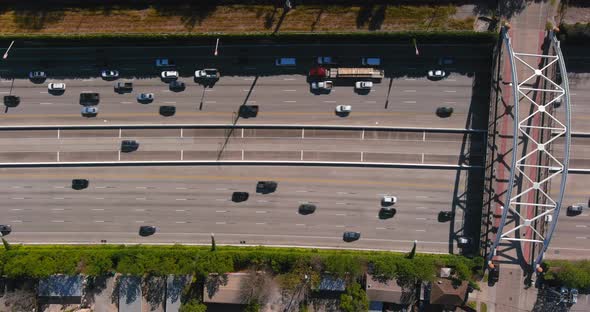 Aerial of cars on 59 South freeway in Houston, Texas on a bright sunny day