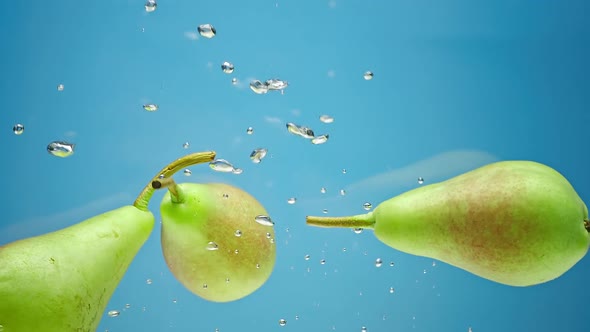 Yellow Pears Floats in Water