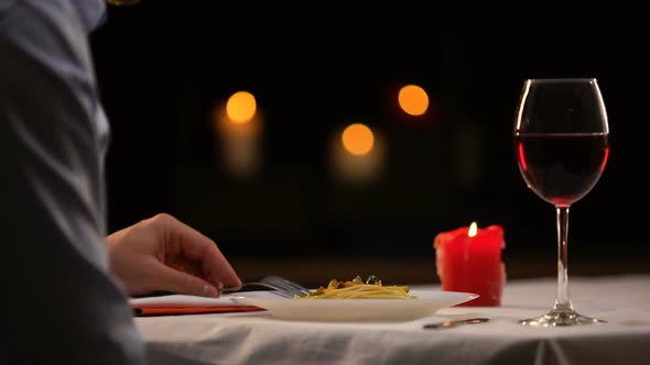 Male Finding Disgusting Long Hair on Plate With Spaghetti, Poor Quality Service