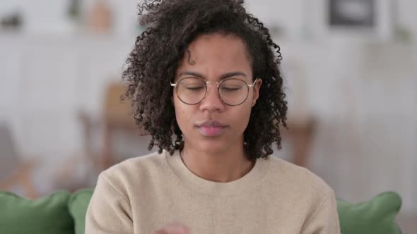 Portrait of African Woman Pointing and Inviting