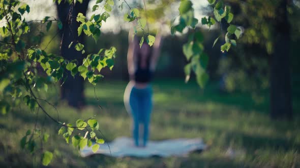 Young Caucasian Girl Meditates in Nature