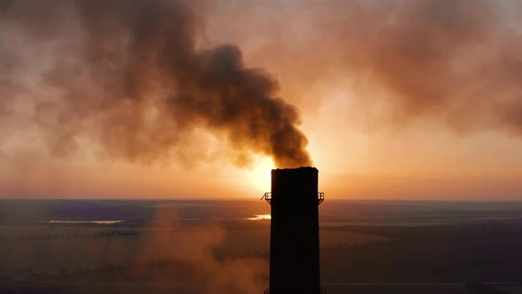 Pipes with Smoke: Industrial Production. Thick Smoke Comes From Industrial Chemney. Concept Air