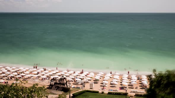 Aerial View Timelapse of Tourist on the Beach