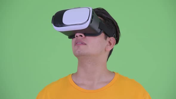 Face of Happy Young Multi Ethnic Man Using Virtual Reality Headset