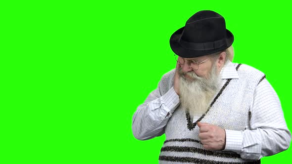 Old Man Having Toothache on Green Screen