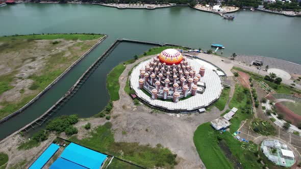 top down aerial view of 99 orange domes mosque in Makassar city Sulawesi indonesia along the water o