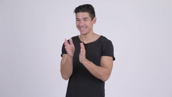 Young Happy Multi-ethnic Man Clapping Hands