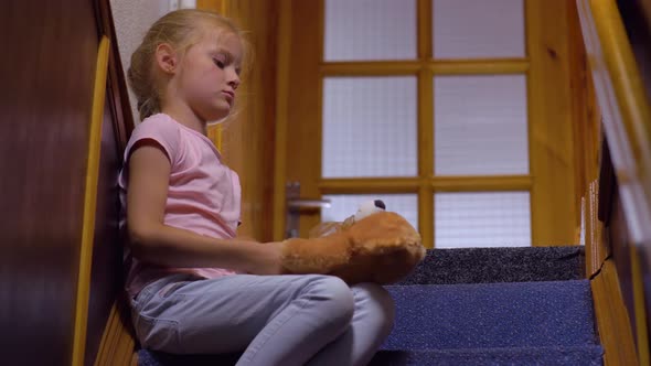 Bored Girl With Toy Bear