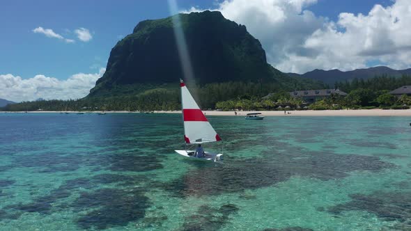 Elderly Man Sailing on Yacht at the Indian Ocean