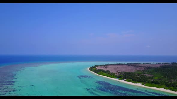 Aerial top view landscape of perfect coastline beach holiday by turquoise water and white sandy back