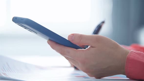 Businesswoman Hand Calculating Tax Data