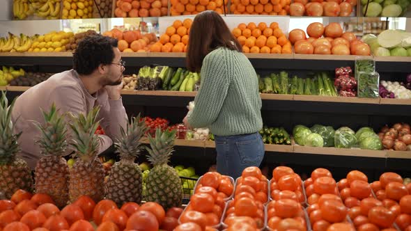 Picky Shopper Choosing Products in Supermarket