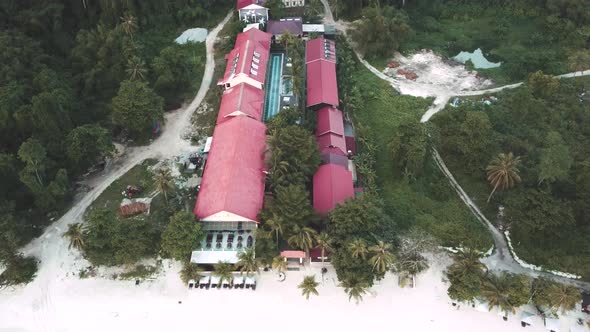 Drone footage from Malaysia island. Beach side tropical season fell.