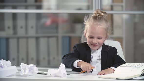 Little Business Girl at Table