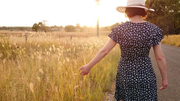 Woman Walking Road