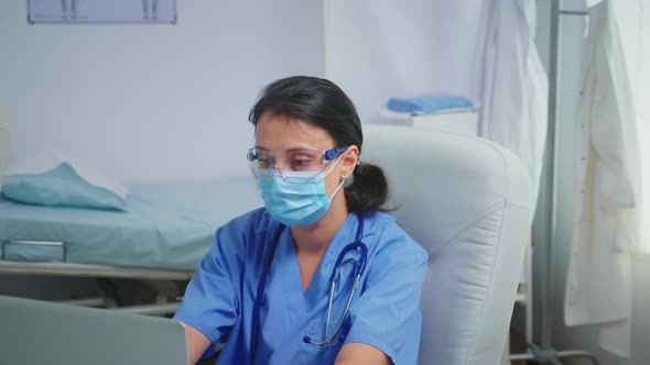 Ward Assistant Having Protection Mask and Glasses