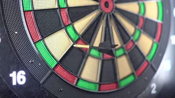 Throwing three darts into the target aim and missing a ten points circle. making mistakes, failure l