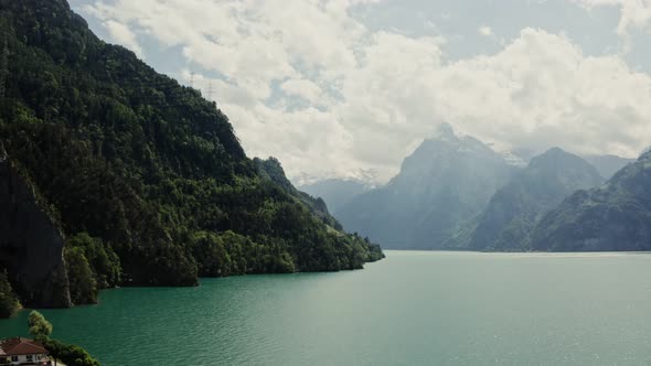 Lakeside Town in the Alps Drone Video Switzerland