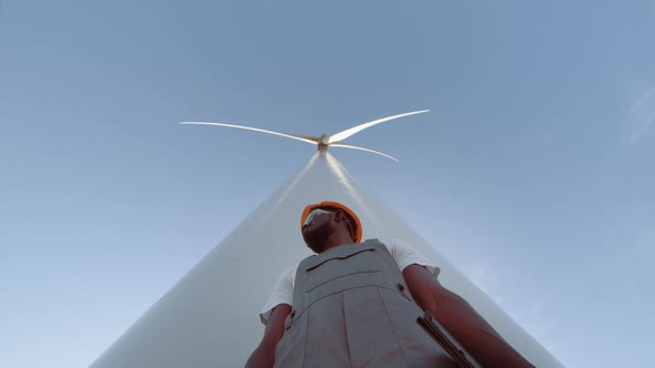 Portrait Engineer Near Wind Turbines Develop Ecological Energy