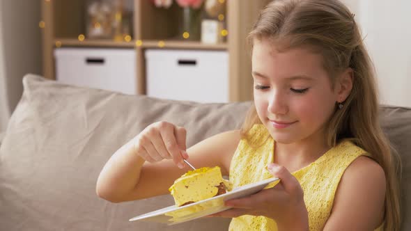 Girl Eating Cake at Home