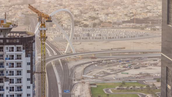 Skyscrapers and Road with Bridge Before Sunset Timelapse of Doha Qatar