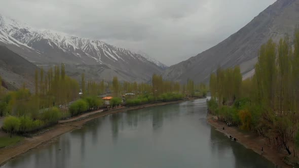 Aerial Dolly Back Over Gilgit River In the Phander Valley In Pakistan