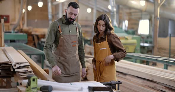 Teamwork of Creative Carpentry Workers at the Manufacturing