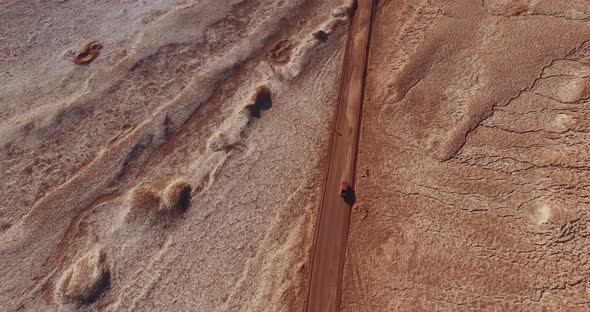 Top Down View Over the Road in an Unusual Desert Terrain of the Moon Valley in Atacama Desert, Chile