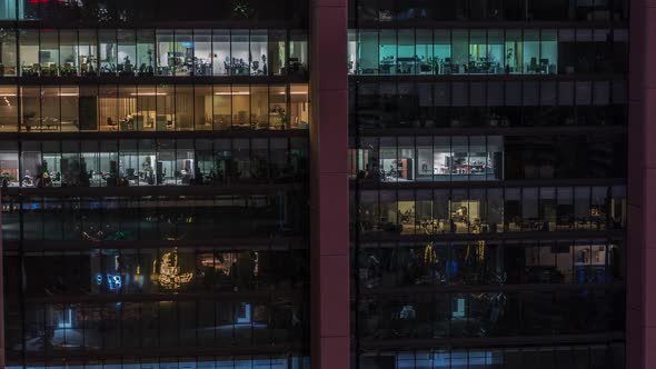 Big Glowing Windows in Modern Office and Residential Buildings Timelapse at Night