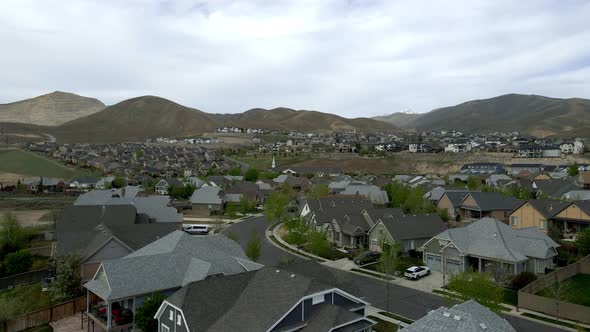 Flying over a middle-class neighborhood in the foothills of a picturesque community