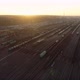 Flying Aerial View Over a Railway Sorting Station at Sunset - VideoHive Item for Sale