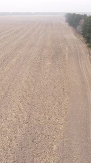 Vertical Video of a Field with Plowed Land in Autumn Slow Motion