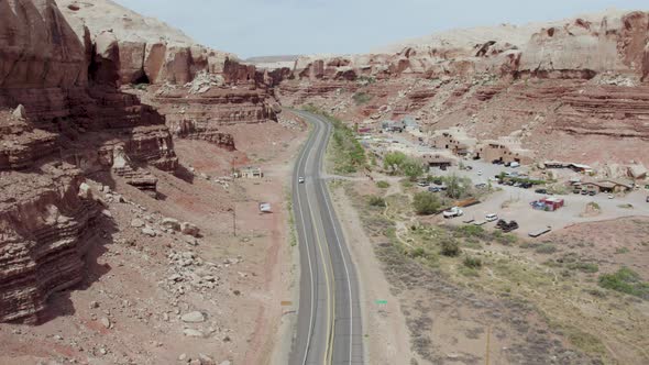 Desert Valley Road of Red Rock Cliffs in Desert Town of Bluff, Utah, Aerial