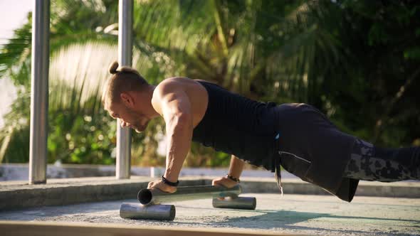 Athletic Man Working Out at an Outdoor Gym. Strength and Motivation.