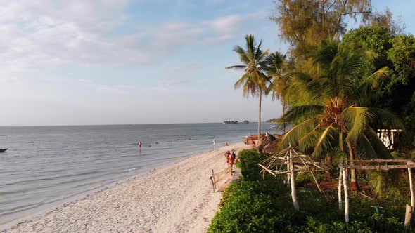 Paradise Coast Resort with Palm Trees and Hotels By Ocean Zanzibar Aerial View