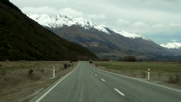 A first person view of driving through the beautiful country of New Zealand