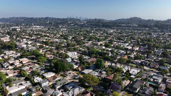 Los Angeles Suburb Flyover With Downtown La In Background